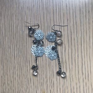 White flowery earrings